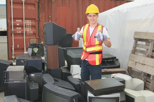 Skips lined up at a depot representing skip hire operations
