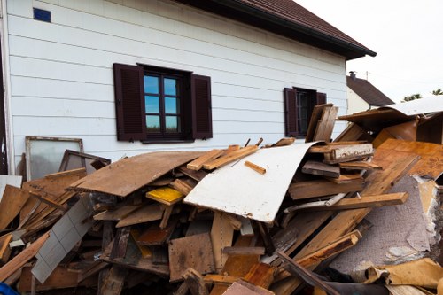 Professional team handling demolition debris in Alperton